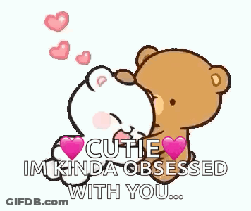A Couple Of Teddy Bears Standing Next To Each Other With Hearts On Them . GIF