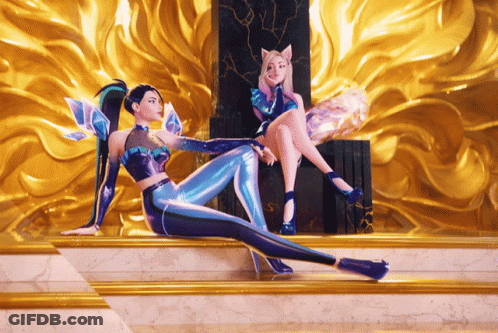 A Couple Of Women Sitting Next To Each Other On A Throne GIF