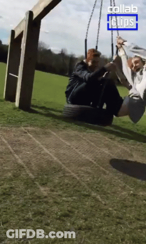 A Couple Sitting On A Tire Swing With The Words Collab Clips On The Bottom GIF