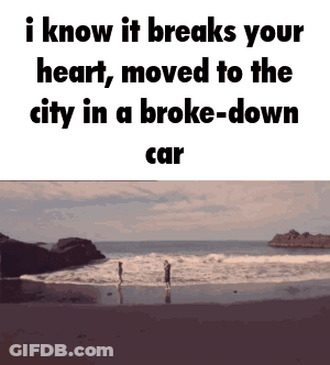 A Couple Standing On A Beach With The Words I Know It Breaks Your Heart Moved To The City In A Broke Down Car GIF