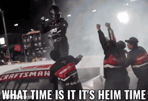 A Craftsman Race Car Is Being Lifted By A Man GIF