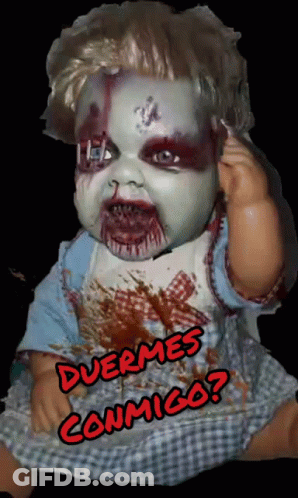 A Creepy Baby Doll With The Words Duermes Conmigo Written On The Bottom GIF