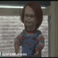 A Creepy Doll Is Standing In Front Of A Window . GIF