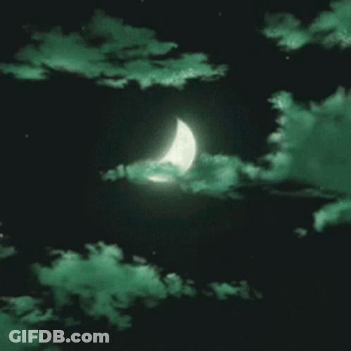 A Crescent Moon Is Visible Through The Green Clouds In The Night Sky GIF