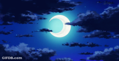 A Crescent Moon Shines Brightly In The Night Sky GIF