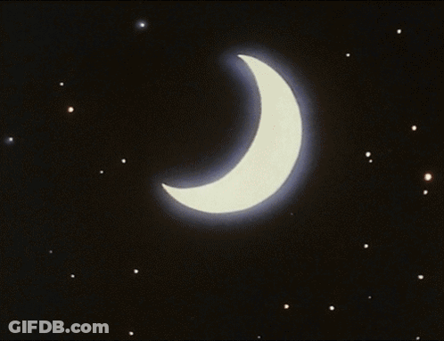 A Crescent Moon With A Blue Beam Coming Out Of It In The Night Sky GIF
