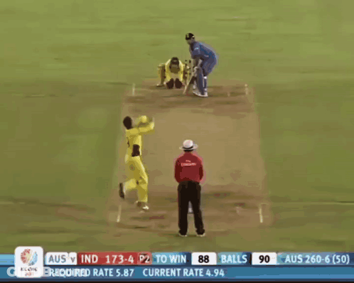 A Cricket Game Is Being Played In Front Of An Ad For Pepsi And Fly Emirates GIF