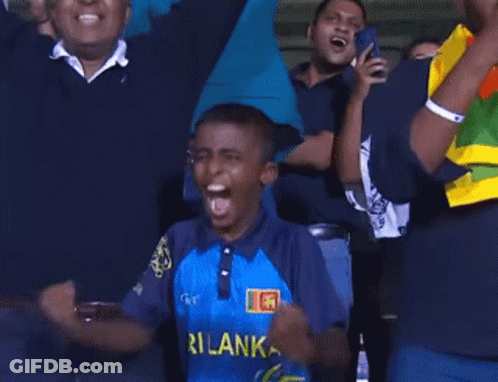 A Cricket Player From Sri Lanka Is Holding A Bat And Wearing A Helmet GIF