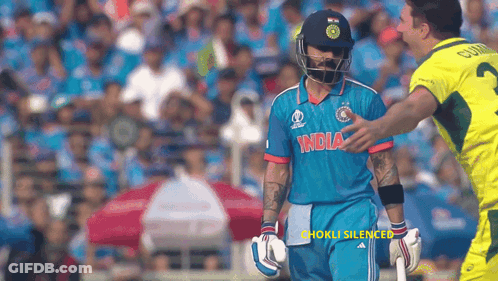 A Cricket Player Wearing A Blue Jersey That Says India On It GIF