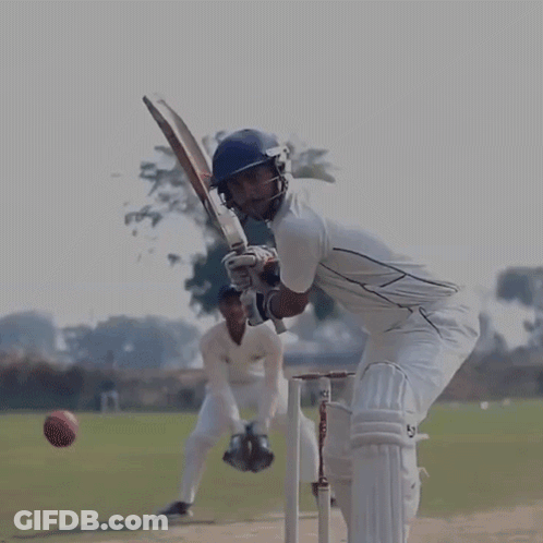A Cricket Player Wearing A Helmet And Gloves With The Letters Sb On The Bat GIF