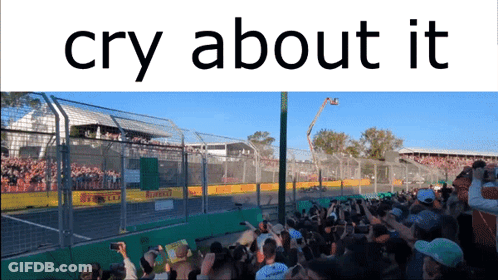 A Crowd At A Race Track With The Words Cry About It GIF