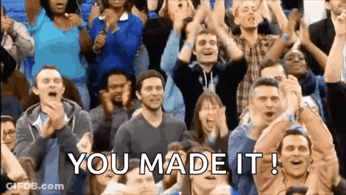 A Crowd Of People Applauding With The Words " You Made It " Written On The Bottom GIF