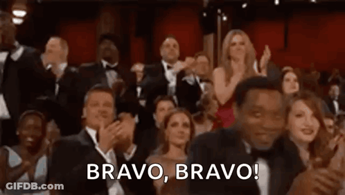 A Crowd Of People Are Applauding At An Oscars Ceremony And A Man Is Saying `` Bravo , Bravo ! '' GIF