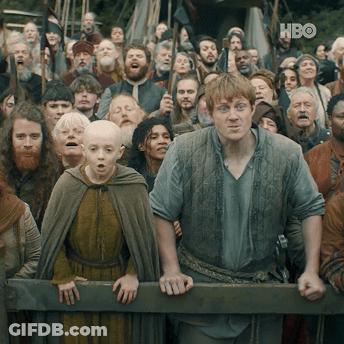 A Crowd Of People Are Gathered In Front Of A Fence With Hbo Written On The Bottom Right GIF
