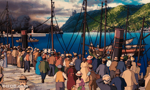 A Crowd Of People Are Gathered In Front Of Boats In The Water GIF