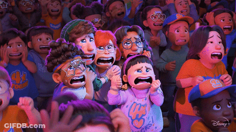 A Crowd Of People Are Watching A Disney + Animated Movie GIF