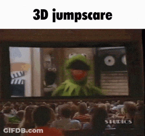 A Crowd Of People Are Watching A Sesame Street Movie With Kermit The Frog On The Screen . GIF