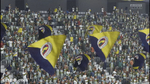 A Crowd Of People In A Stadium With A Ea Sports Logo In The Background GIF