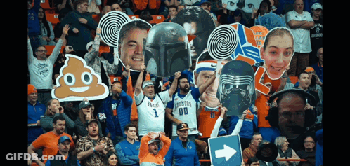 A Crowd Of People In A Stadium With One Wearing A Number 1 Shirt GIF
