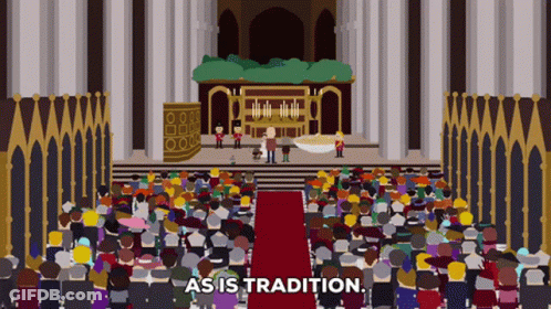 A Crowd Of People Sitting In Front Of A Stage With The Words As Is Tradition GIF