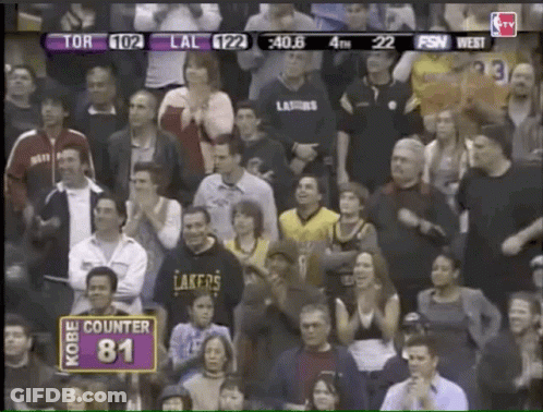 A Crowd Of People Watching A Basketball Game With A Sign That Says Kobe Counter 81 GIF
