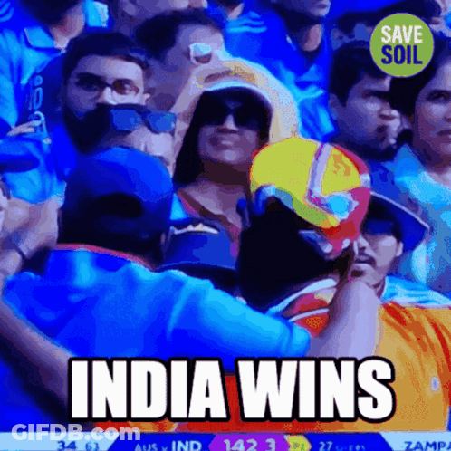 A Crowd Of People Watching A Cricket Game With The Words India Wins Above Them GIF