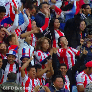 A Crowd Of People Wearing Red White And Blue Striped Shirts With The Letter O On The Front GIF