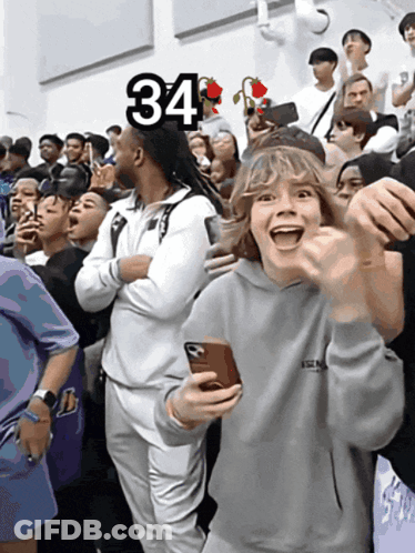 Crowd With Number 34 On Top GIF