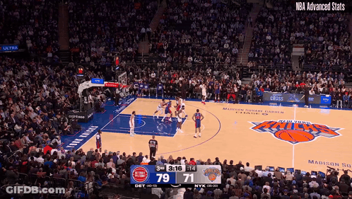 A Crowd Watching A Basketball Game With The Score 79 71 GIF