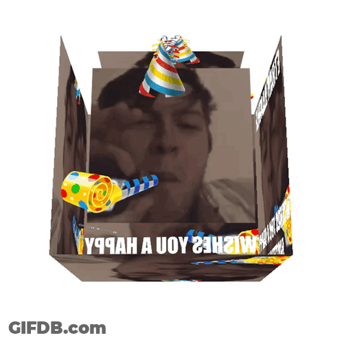 A Cube With A Picture Of A Man And The Words " Y9cah A Uoy 23H " Written On It GIF