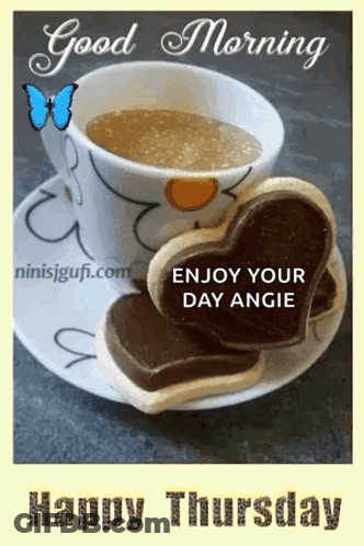 A Cup Of Coffee And Two Heart Shaped Cookies On A Saucer GIF