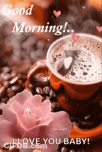 A Cup Of Coffee Is Sitting On Top Of A Pile Of Coffee Beans Next To A Pink Flower . GIF