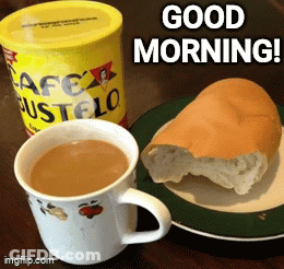 A Cup Of Coffee Next To A Can Of Cafe Bustelo And A Half Eaten Loaf Of Bread On A Plate GIF