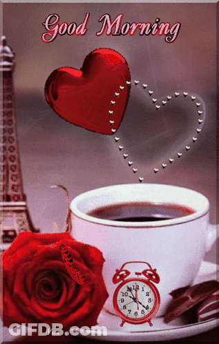 A Cup Of Coffee Next To A Red Rose And An Alarm Clock That Says Good Morning On It GIF