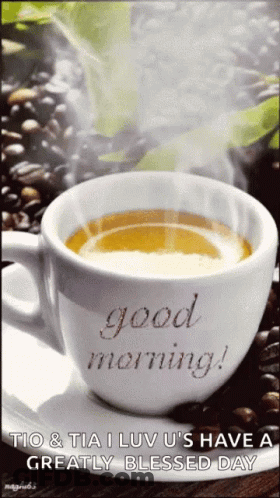 A Cup Of Coffee On A Saucer That Says " Good Morning " GIF