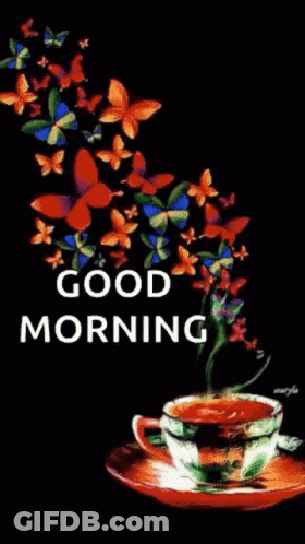 A Cup Of Coffee On A Saucer With Butterflies Flying Around It . GIF