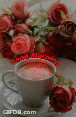 A Cup Of Coffee Sits On A Saucer Next To A Bouquet Of Pink Roses And Says Good Morning GIF