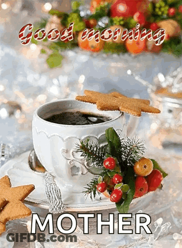 A Cup Of Coffee Sits On A Saucer Next To A Gingerbread Cookie And Says Good Morning Mother GIF