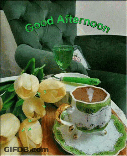 A Cup Of Coffee Sits On A Saucer Next To Flowers And A Glass Of Wine With The Words Good Afternoon On It GIF