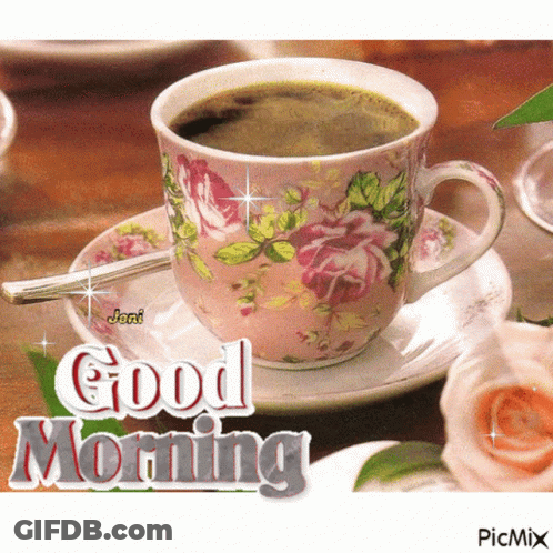 A Cup Of Coffee Sits On A Saucer With The Words Good Morning Written Above It GIF