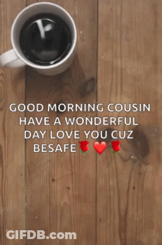 A Cup Of Coffee Sits On A Wooden Table Next To A Good Morning Message GIF