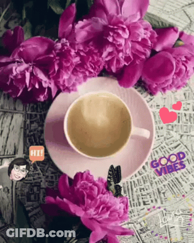 A Cup Of Coffee Surrounded By Purple Flowers With The Words Good Vibes Written On The Bottom GIF