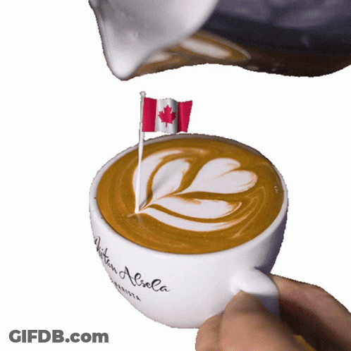 A Cup Of Coffee With A Canadian Flag On Top Of It GIF
