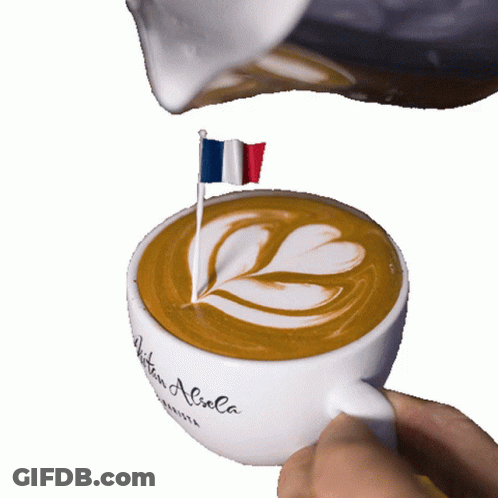 A Cup Of Coffee With A Flag Sticking Out Of It That Says Boston Aliola GIF