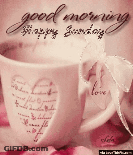 A Cup Of Coffee With A Heart On It And The Words `` Good Morning Happy Sunday '' Written On It . GIF