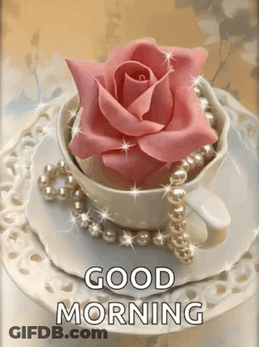 A Cup Of Coffee With A Pink Rose And Pearls On A Saucer With The Words `` Good Morning '' . GIF