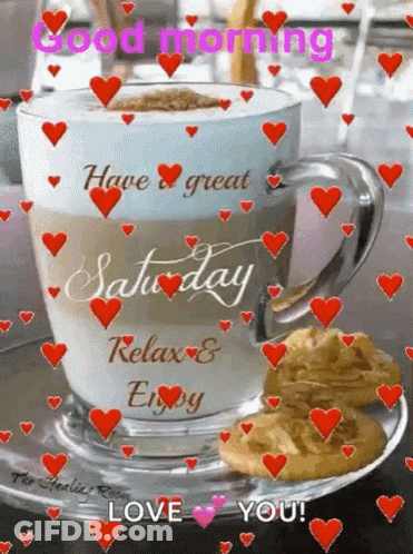 A Cup Of Coffee With Cookies On A Saucer And Hearts Around It . GIF