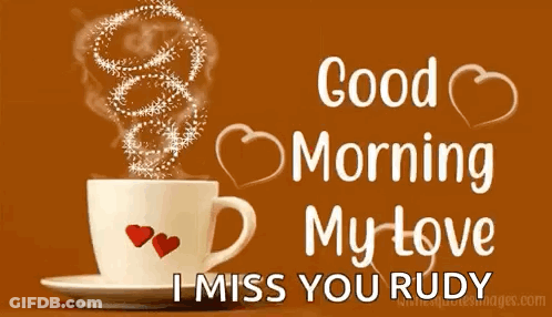 A Cup Of Coffee With Hearts On It And The Words `` Good Morning My Love I Miss You Rudy '' Written On It . GIF
