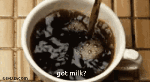 A Cup Of Coffee With The Words Got Milk Written On The Side GIF