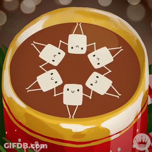 A Cup Of Hot Chocolate With A Circle Of Marshmallows In It GIF